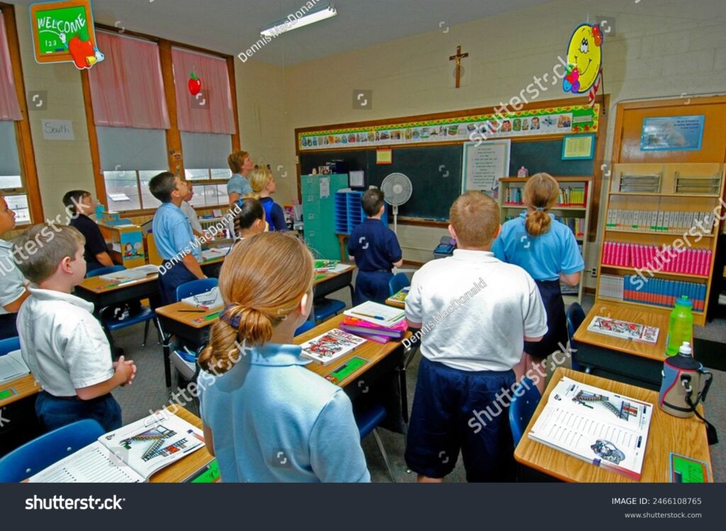 stock-photo-daily-classroom-prayer-takes-place-at-st-marys-catholic-elementary-school-classroom-instruction-st-2466108765 - Restore American Schools